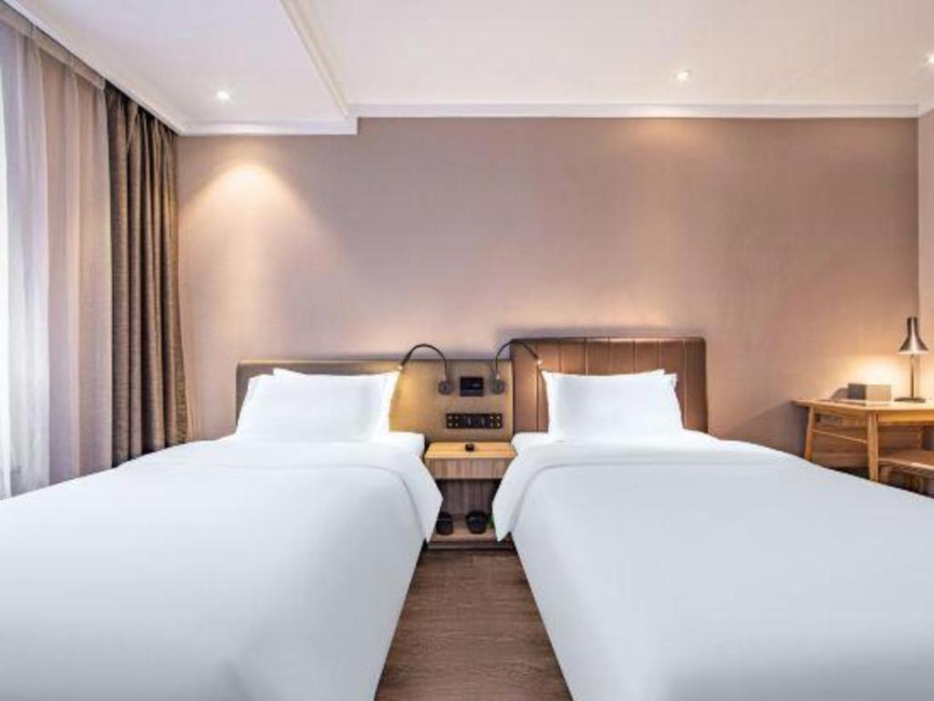 Hanting Premium Loushanguan Road Metro Station Hotel 3*